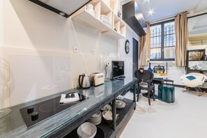 Fridge, microwave, stovetop, coffee/tea maker