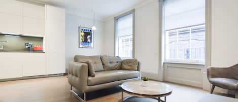 Soho Deluxe 1 Bedroom Apartment | Living area | Flat-screen TV, heated floors