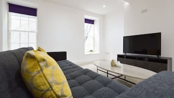 Large Lower Ground Floor Studio | Living area | Flat-screen TV, heated floors