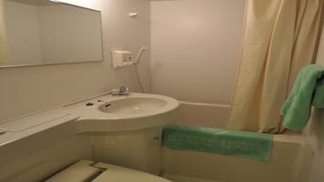Single Room, 1 Bedroom, Smoking | Bathroom | Free toiletries, hair dryer, slippers