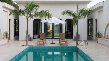 3 outdoor pools, pool umbrellas