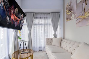 Panoramic Apartment, 2 Bedrooms, Balcony, Sea View | Living area | Flat-screen TV - The Radiance Manila Bay (Pasay)