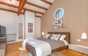 4 bedrooms, iron/ironing board, travel cot, WiFi