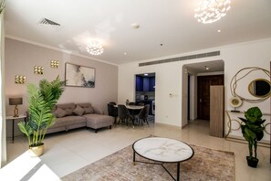 Deluxe Apartment | Living area - Yogi - Marina Marvel Luxurious 1BR Apt at Al Shera Tower (Dubai)