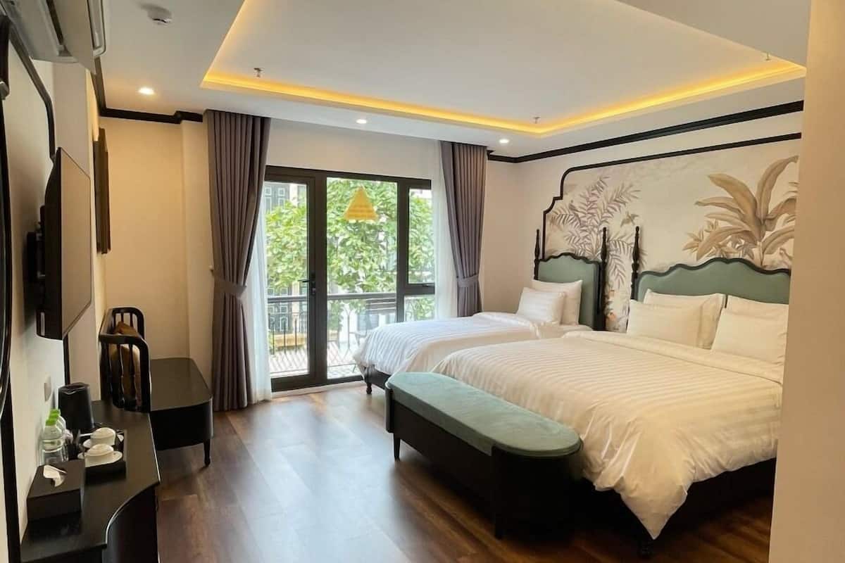 Junior Triple Room, Balcony, City View | Memory-foam beds, minibar, in-room safe, desk