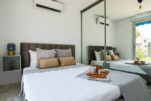 2 عدّة غرف نوم ومكواة/لوح كي وواي فاي وملاءات أسرّة