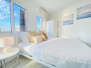 1 habitación, tabla de planchar con plancha, wifi y ropa de cama 