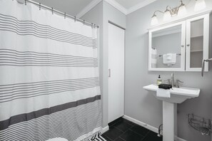 Shower, hair dryer, towels - Pet-friendly home with fenced-in yard and hot tub (Grawn)