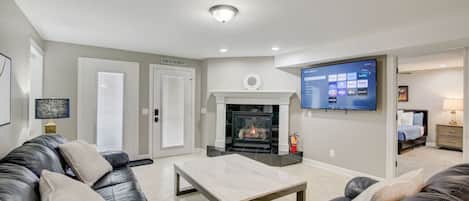 Smart TV, fireplace, books