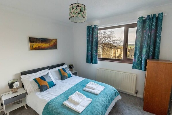 4 bedrooms, iron/ironing board, travel cot, WiFi