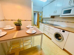 Microwave, oven, stovetop, dishwasher - Cozy 2BR Apartment with Pool in Jaca – Sleeps 6, 2 Bathrooms (Jaca)