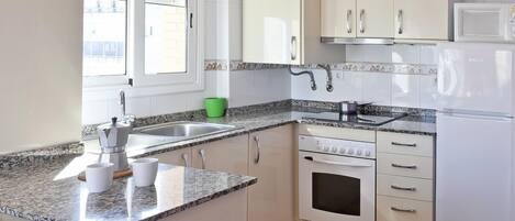 Fridge, microwave, oven, coffee/tea maker