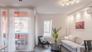 City Apartment | Living area | LCD TV