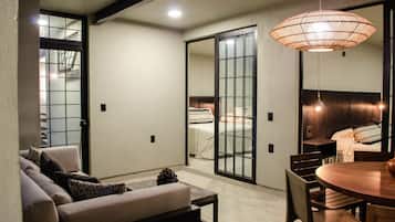 Apartamento superluxo | Área de estar | Smart TV 50 polegadas com canais digitais, Netflix, smart speakers