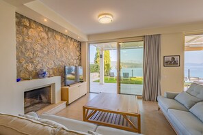 Smart TV, fireplace - Villa Isabelle, a superb 5 bedroom villa, overlooking the Ionian Pelagus!  (Lefkada)