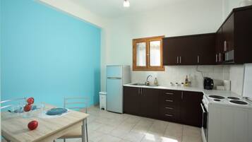 Fridge, coffee/tea maker, toaster, cookware/dishes/utensils