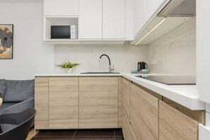 Fridge, microwave, stovetop, cookware/dishes/utensils