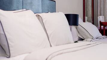 Individually decorated, desk, laptop workspace, iron/ironing board