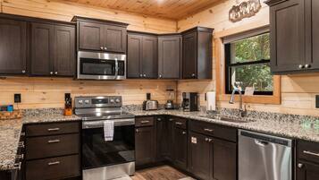 Cabin, 2 Bedrooms | Private kitchen | Fridge, oven, coffee/tea maker, toaster