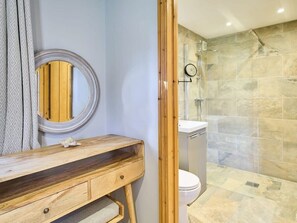 Shower, hair dryer, towels, shampoo