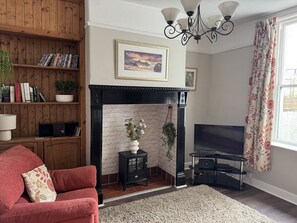 Fernseher, Kamin