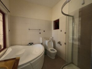 Deluxe Apartment | Bathroom | Slippers