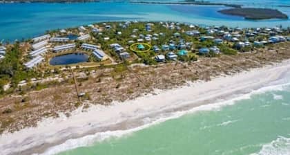 Experience the charm of island tranquility with this enchanting 4-bedroom