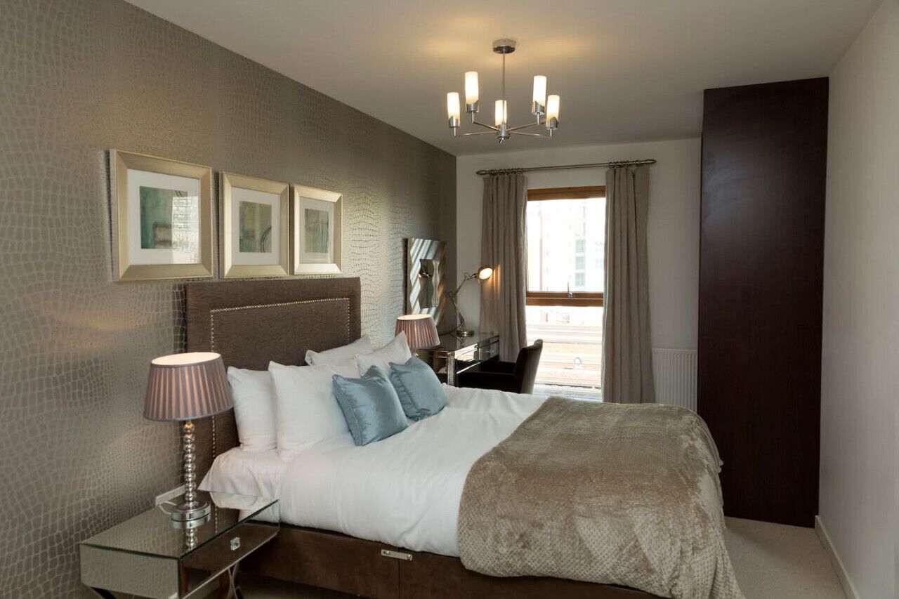 2 dormitorios, tabla de planchar con plancha, wifi gratis y ropa de cama