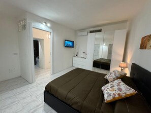 2 chambres, fer et planche à repasser, Wi-Fi, draps fournis