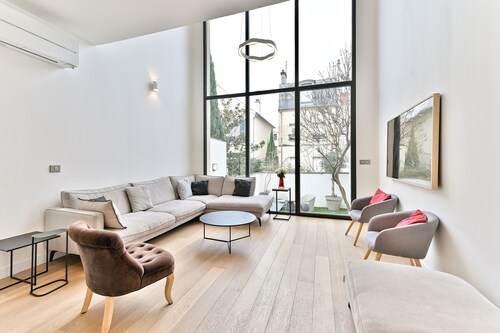 Maison d'architecte à 15 min du centre de Paris !