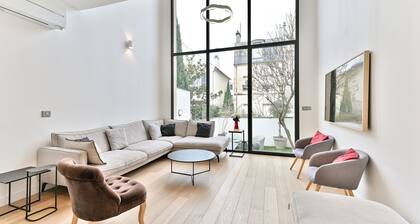 Maison d'architecte Ă 15 min du centre de Paris !