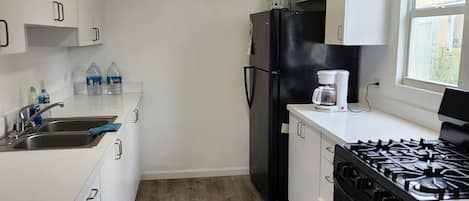 Microwave, oven, stovetop, coffee/tea maker