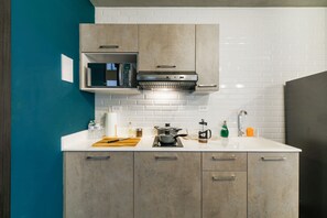 Appartement Deluxe, 2 chambres | Cuisine privée | Réfrigérateur grande capacité avec congélateur, four à micro-ondes