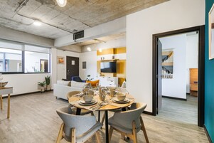 Deluxe Apartment, 2 Bedrooms | Private kitchen | Full-size fridge, microwave, stovetop, coffee/tea maker