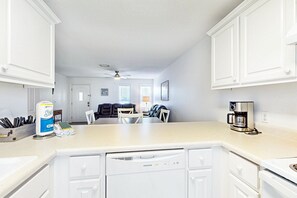 Fridge, microwave, oven, stovetop - Coastal getaway steps from the bay with patio, balcony, smart TVs, & W/D (Port St. Joe)
