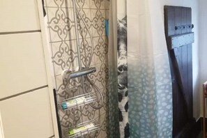 Shower, eco-friendly toiletries, hair dryer, towels