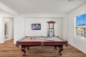 Unwind with a classic game - our pool table awaits