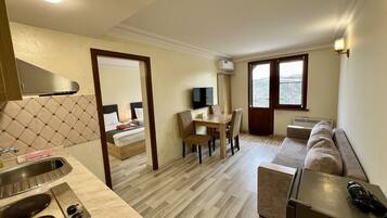 Apartamento luxo | 1 quarto, roupas de cama premium, escrivaninha