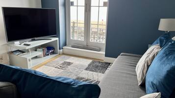 City Apartment | Living area | Flat-screen TV