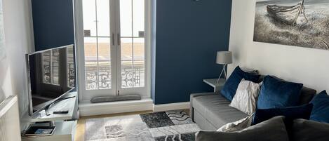 City Apartment | Living area | Flat-screen TV