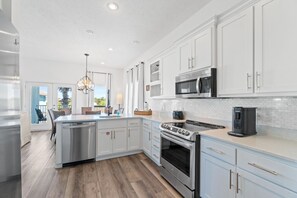 House, 5 Bedrooms, Hot Tub | Private kitchen | Full-size fridge, microwave, oven, stovetop - Beach House - The Sandcastle by PHG (Panama City Beach)