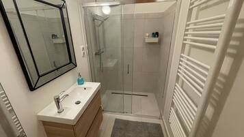 Hair dryer, towels, soap, shampoo