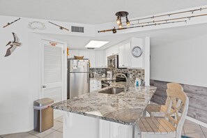 Fridge, microwave, oven, stovetop - Relaxing AquaVista Condo w/ Gulf Views, Hot Tub & Covered Parking (Panama City Beach)