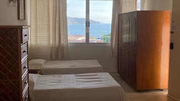 Habitació doble familiar, diversos llits | Wifi gratuïta