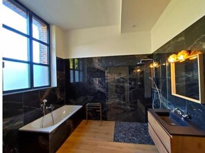 Shower, hair dryer, towels, toilet paper
