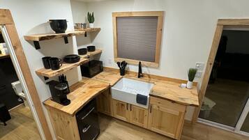 Fridge, microwave, stovetop, coffee/tea maker