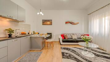 House | Living area | 40-inch LED TV with cable channels