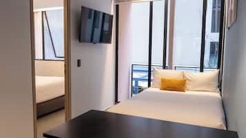 Quarto duplo empresarial | Área de estar | Smart TV