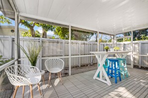 Outdoor dining - The Blue House. Steps from Wilton Drive! Outdoor sitting and dining, Grill, WD (Wilton Manors)