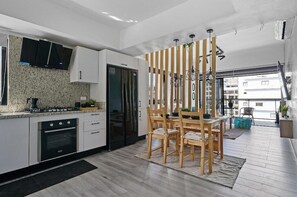 Fridge, microwave, oven, stovetop - Modern City Center 1-BR Apt w/ Couch (Santo Domingo)